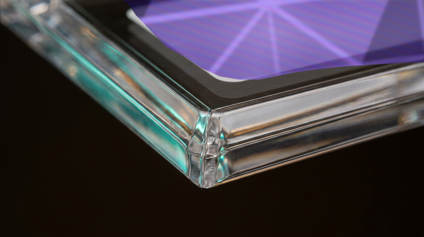 Macro detail of the bevelled edge of a clear card holder