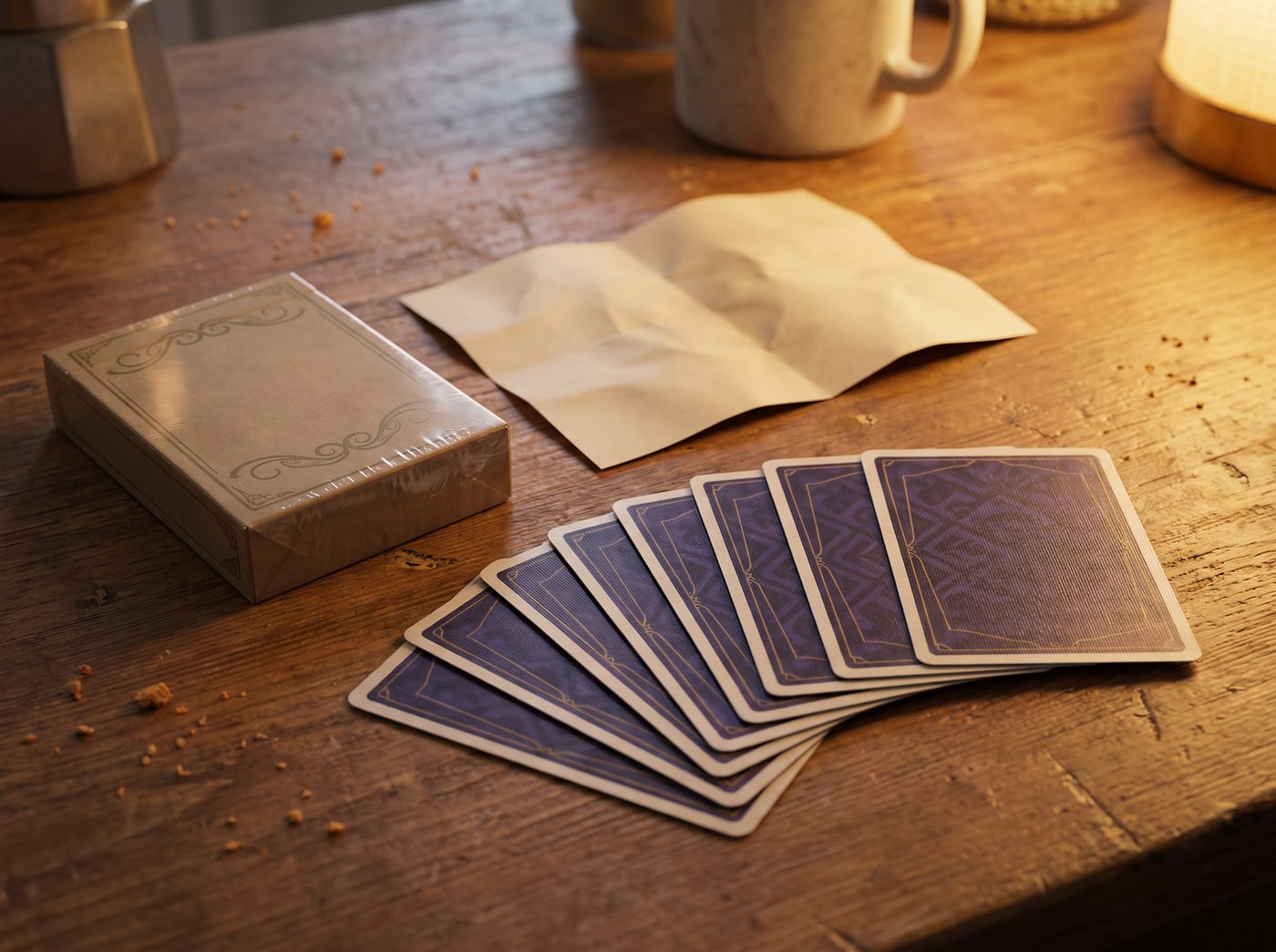 A starter set on a kitchen table: sealed deck box, folded rules leaflet, a fanned hand seen from behind.